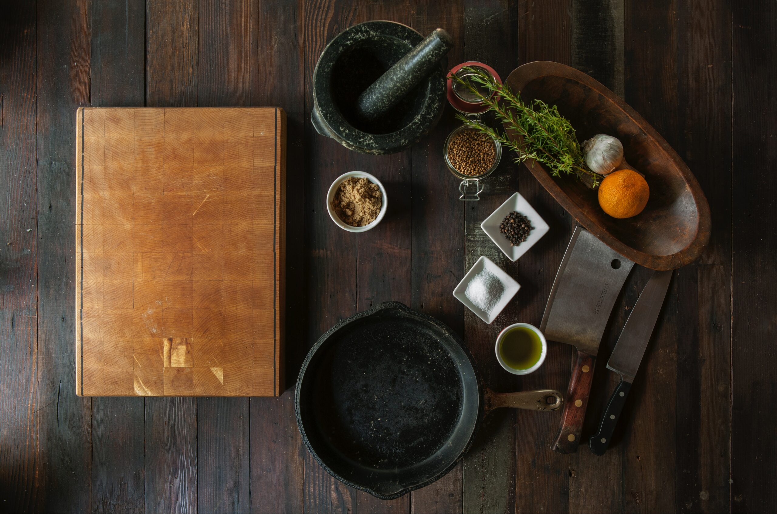 A kitchen counter with assorted kitchen tools.